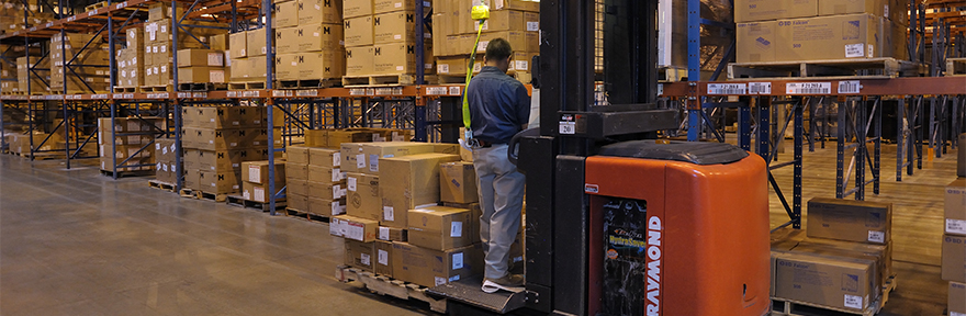 Supply Center crates and employee on forklift